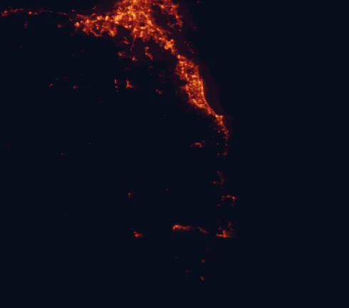 Satellite night-light map of the 100 km around Wollumbin National Park, with Gold Coast, Logan City and Figtree marked