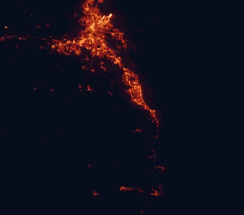Satellite night-light map of the 100 km around Springbrook National Park, with Brisbane, Gold Coast and Logan City marked