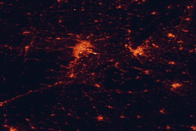 Satellite night-light map of the 100 km around Mannersdorf-Wüste Nature Park, with Vienna, Bratislava and Petržalka marked
