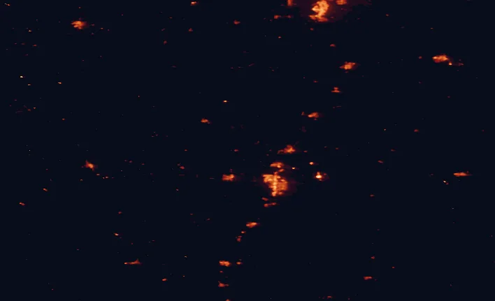 Satellite night-light map of the 100 km around Aspen Beach Provincial Park, with Red Deer, Sylvan Lake and Lacombe marked