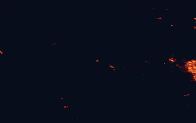 Satellite night-light map of the 100 km around Banff National Park, with Canmore and Cochrane marked