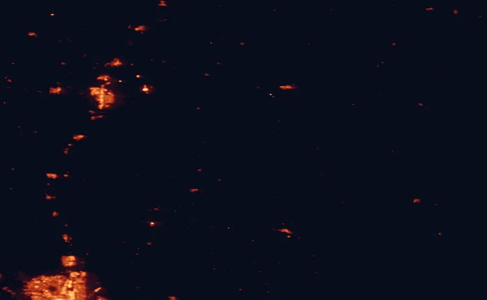 Satellite night-light map of the 100 km around Dry Island Buffalo Jump Provincial Park, with Red Deer, Airdrie and Sylvan Lake marked