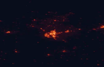 Satellite night-light map of the 50 km around Lethbridge, with Coaldale, Raymond and Fort Macleod marked