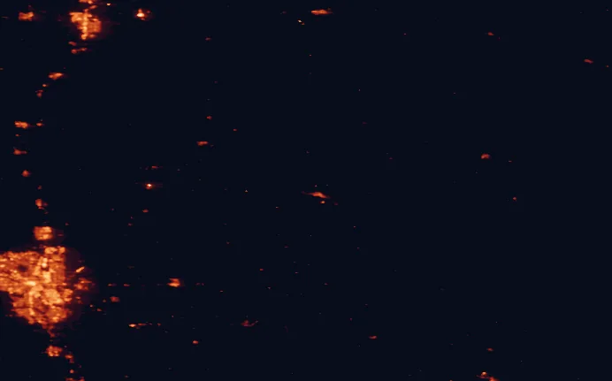 Satellite night-light map of the 100 km around Midland Provincial Park, with Calgary, Airdrie and Red Deer marked