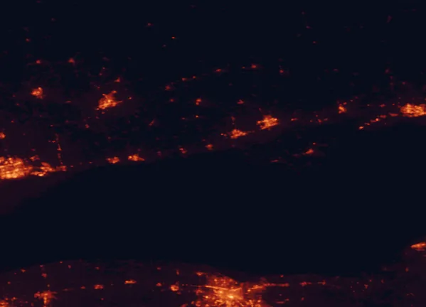 Satellite night-light map of the 100 km around Presqu'ile Provincial Park, with Rochester, Oshawa and Quinte West marked