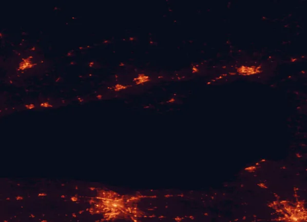 Satellite night-light map of the 100 km around Sandbanks Provincial Park, with Rochester, Kingston and Belleville marked