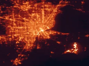 Satellite night-light map of the 50 km around Windsor, with Detroit, Warren and Dearborn marked