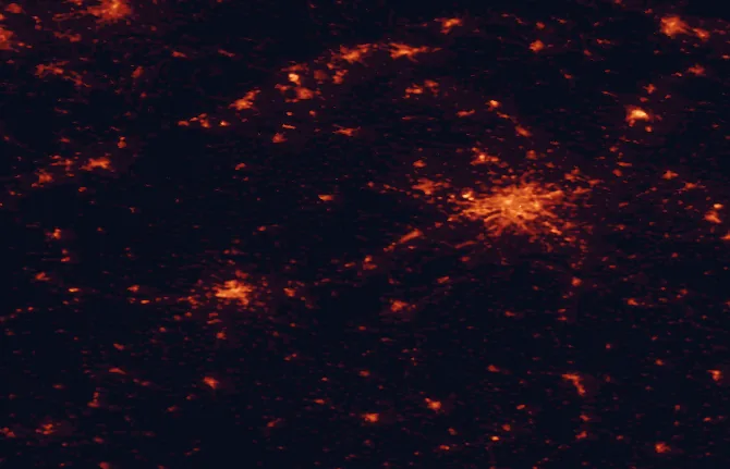 Satellite night-light map of the 100 km around Křivoklátsko Protected Landscape Area, with Prague, Pilsen and Kladno marked