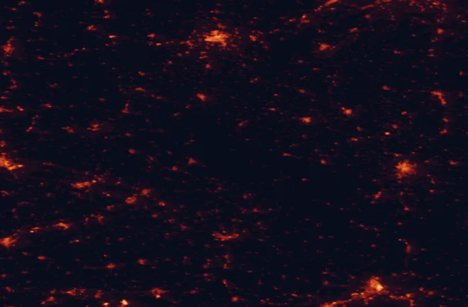 Satellite night-light map of the 100 km around Šumava National Park, with Pilsen, Linz and České Budějovice marked