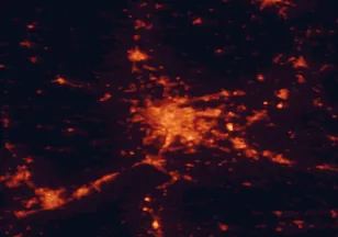 Satellite night-light map of the 50 km around Lyon, with Vénissieux, Saint-Étienne and Caluire-et-Cuire marked
