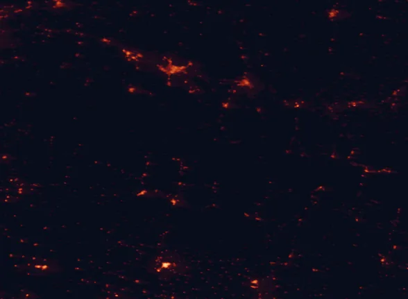 Satellite night-light map of the 100 km around Pyrénées National Park, with Pau, Tarbes and Huesca marked