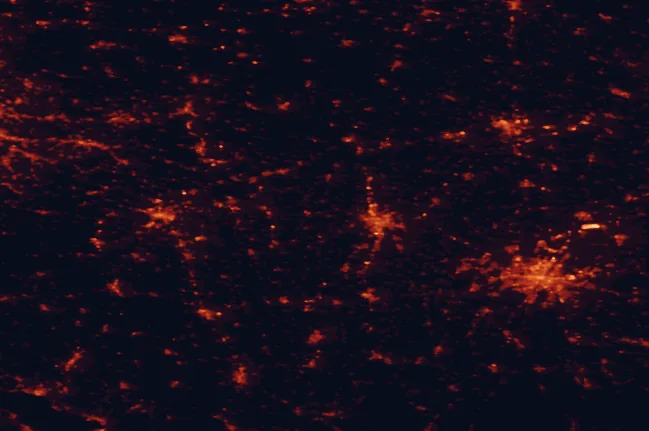 Satellite night-light map of the 100 km around Augsburg-Western Woods Nature Park, with Munich, Augsburg and Ulm marked