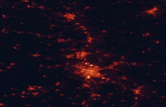 Satellite night-light map of the 50 km around Erlangen, with Nuremberg, Fürth and Bamberg marked