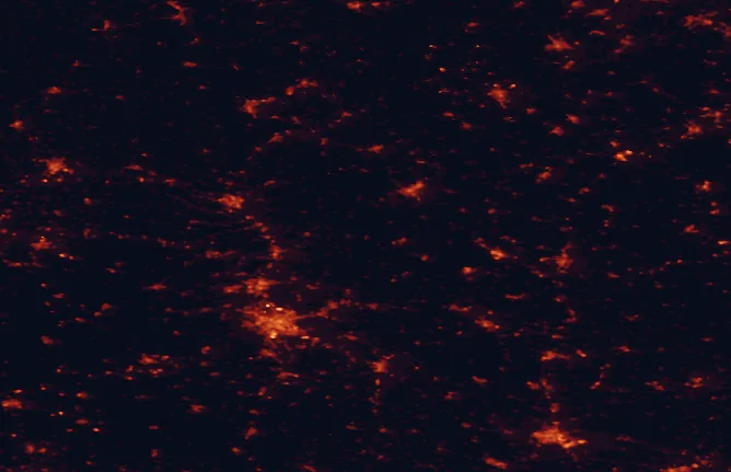 Satellite night-light map of the 100 km around Franconian Switzerland-Veldenstein Forest Nature Park, with Nuremberg, Fürth and Erlangen marked