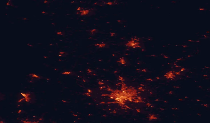 Satellite night-light map of the 100 km around Aukrug Nature Park, with Hamburg, Kiel and Lübeck marked