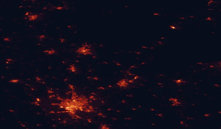Satellite night-light map of the 100 km around Holstein Switzerland Nature Park, with Hamburg, Kiel and Lübeck marked
