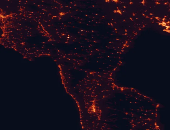 Satellite night-light map of the 100 km around Pollino National Park, with Cosenza, Castrovillari and Potenza marked