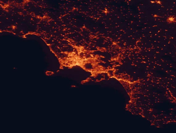 Satellite night-light map of the 100 km around Vesuvius National Park, with Naples, Salerno and Casoria marked