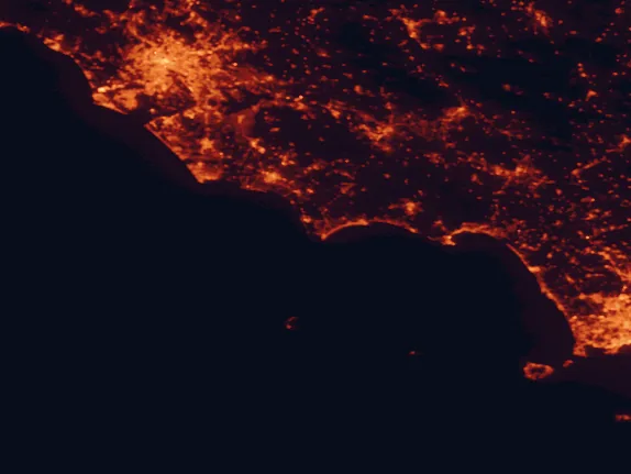 Satellite night-light map of the 100 km around Circeo National Park, with Rome, Latina and Acilia-Castel Fusano-Ostia Antica marked