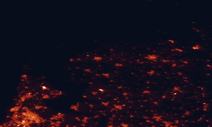 Satellite night-light map of the 100 km around De Alde Feanen National Park, with Amsterdam, Leeuwarden and Groningen marked