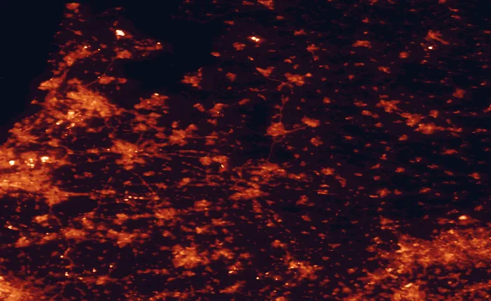 Satellite night-light map of the 100 km around Hoge Veluwe National Park, with Amsterdam, Rotterdam and Utrecht marked