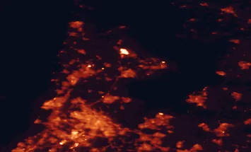 Satellite night-light map of the 50 km around Hoorn, with Amsterdam, Almere Stad and Zaanstad marked