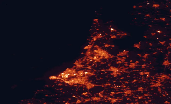 Satellite night-light map of the 100 km around Zuid-Kennemerland National Park, with Amsterdam, Rotterdam and Utrecht marked