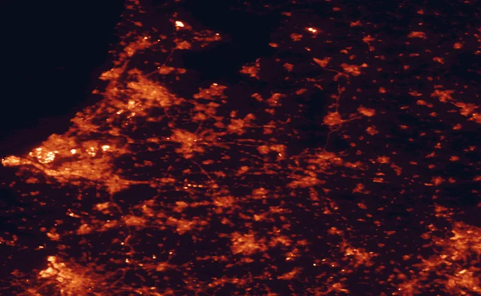 Satellite night-light map of the 100 km around Utrechtse Heuvelrug National Park, with Amsterdam, Rotterdam and Utrecht marked