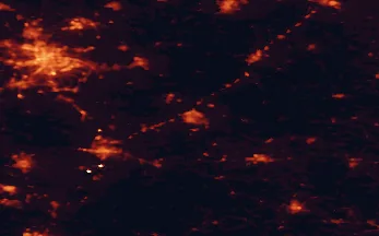 Satellite night-light map of the 50 km around Tomaszów Mazowiecki, with Łódź, Piotrków Trybunalski and Pabianice marked
