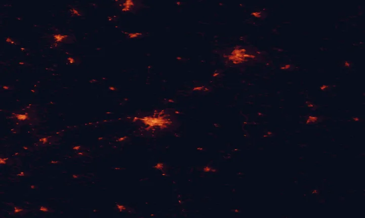 Satellite night-light map of the 100 km around Puszcza Knyszyńska Landscape Park, with Białystok, Hrodna and Łomża marked