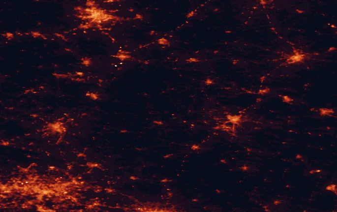 Satellite night-light map of the 100 km around Przedbórz Landscape Park, with Łódź, Kielce and Częstochowa marked