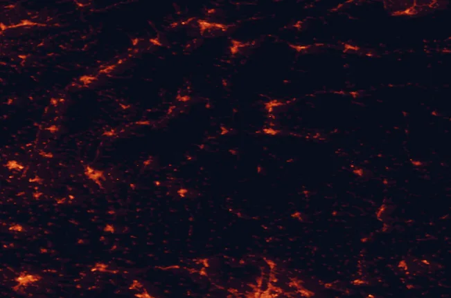 Satellite night-light map of the 100 km around Štiavnické vrchy Protected Landscape Area, with Banská Bystrica, Nitra and Zvolen marked
