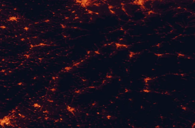 Satellite night-light map of the 100 km around Strážov Mountains Protected Landscape Area, with Žilina, Trenčín and Prievidza marked