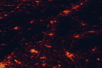 Satellite night-light map of the 50 km around Piešťany, with Nitra, Trnava and Trenčín marked