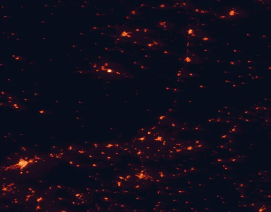 Satellite night-light map of the 100 km around the Andalusian Sierra Morena, with Córdoba, Jaén and Linares marked