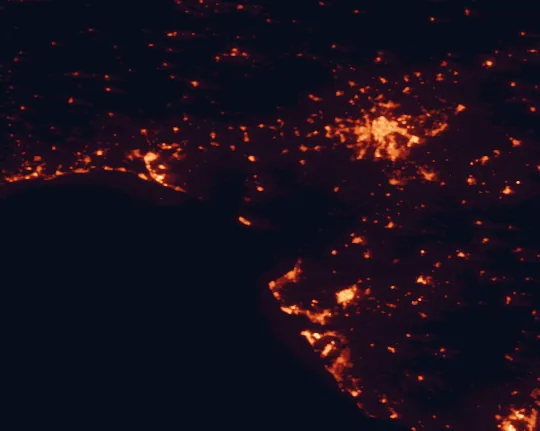 Satellite night-light map of the 100 km around Doñana National Park, with Sevilla, Jerez de la Frontera and Huelva marked