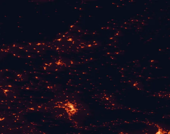 Satellite night-light map of the 100 km around Sierra Mágina, with Granada, Jaén and Linares marked