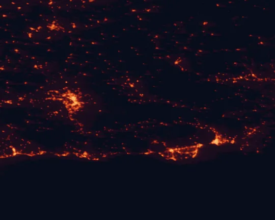 Satellite night-light map of the 100 km around Sierra Nevada National Park, with Granada, Almería and El Ejido marked