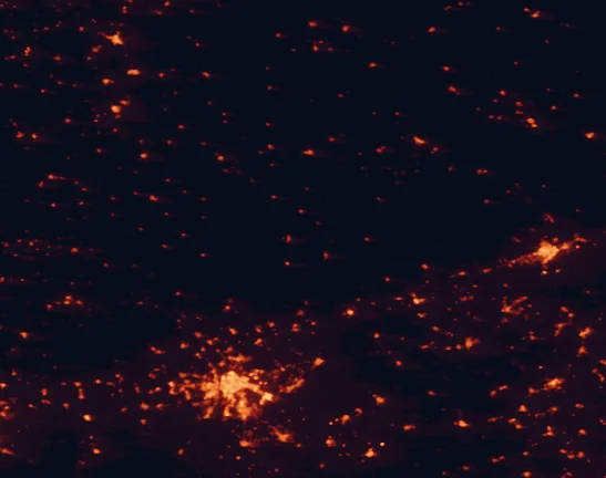 Satellite night-light map of the 100 km around Sierra Norte de Sevilla Natural Park, with Sevilla, Córdoba and Dos Hermanas marked