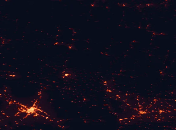 Satellite night-light map of the 100 km around Sierra y Cañones de Guara Natural Park, with Zaragoza, Lleida and Huesca marked