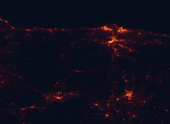 Satellite night-light map of the 100 km around Somiedo Natural Park, with Oviedo, Gijón and León marked