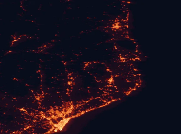 Satellite night-light map of the 100 km around Zona Volcànica de la Garrotxa Natural Park, with Barcelona, L'Hospitalet de Llobregat and Terrassa marked