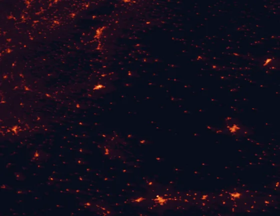 Satellite night-light map of the 100 km around Tajo Internacional Natural Park, with Badajoz, Cáceres and Castelo Branco marked