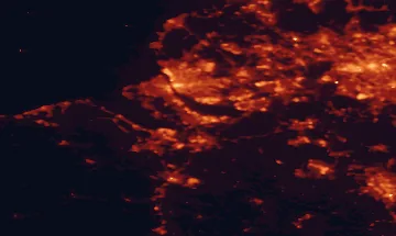 Satellite night-light map of the 50 km around Ellesmere Port, with Liverpool, Birkenhead and Manchester marked