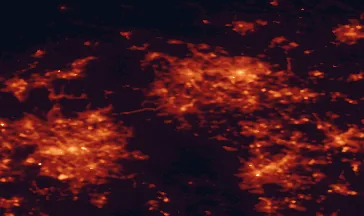 Satellite night-light map of the 50 km around Huddersfield, with Leeds, Bradford and Manchester marked