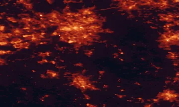 Satellite night-light map of the 50 km around Macclesfield, with Manchester, Sheffield and Stoke-on-Trent marked