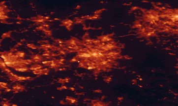 Satellite night-light map of the 50 km around Salford, with Oldham, Liverpool and Stockport marked