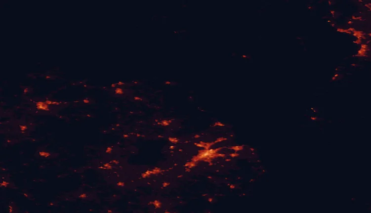 Satellite night-light map of the 100 km around the Antrim Coast and Glens, with Belfast, Newtownabbey and Lisburn marked