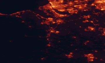 Satellite night-light map of the 50 km around Wrexham, with Liverpool, Birkenhead and Chester marked