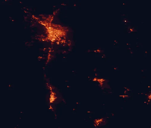 Satellite night-light map of the 100 km around Las Cienegas National Conservation Area, with Tucson, Nogales and Casas Adobes marked